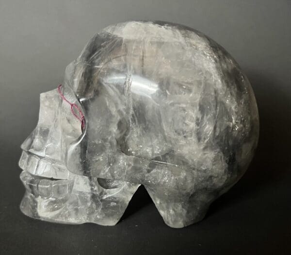 A skull made of paper sitting on top of a table.