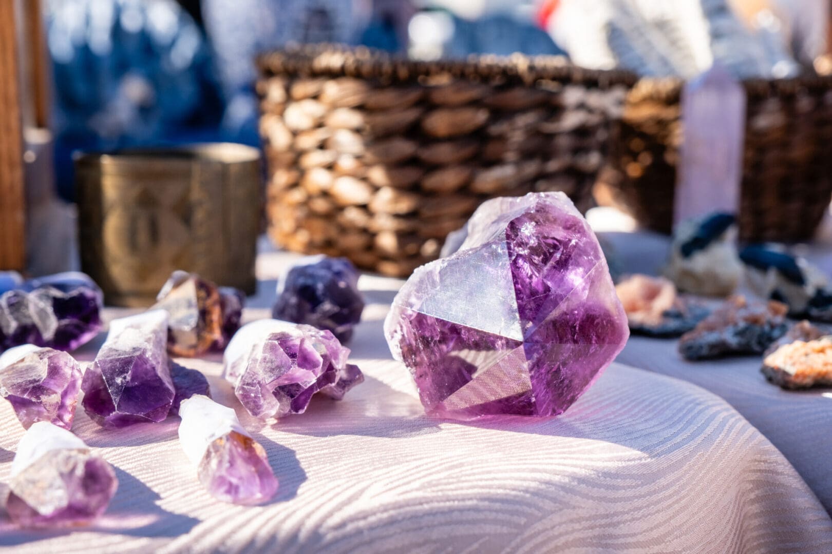 Baby Amethyst Dragon's Teeth Scepters-Bahia on display at an outdoor market.